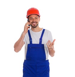 Professional repairman in uniform talking on phone against white background