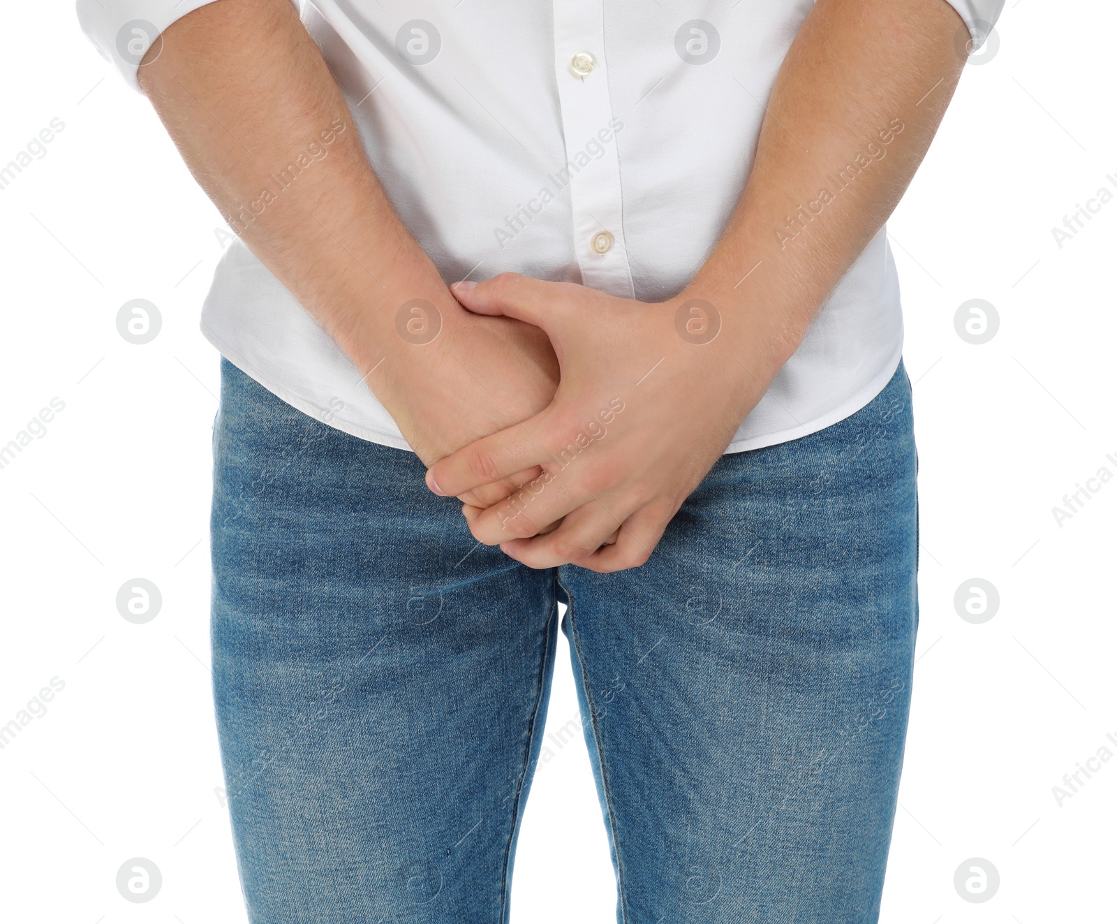 Photo of Man suffering from pain on white background, closeup. Urology problems