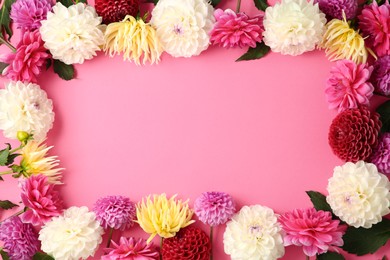 Photo of Frame made of beautiful dahlia flowers on pink background, flat lay. Space for text