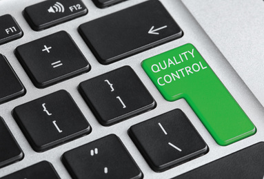 Image of Quality control button on modern computer keyboard, closeup