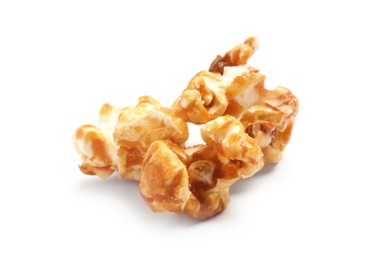 Photo of Delicious caramel popcorn on white background