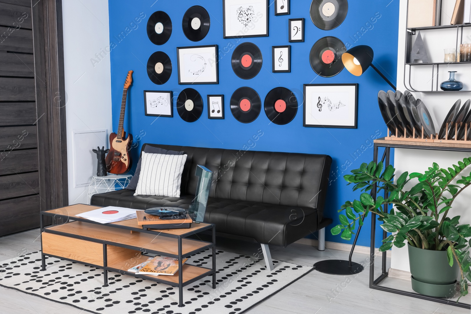 Photo of Living room decorated with vinyl records. Interior design