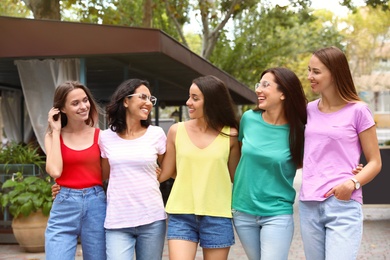 Happy women outdoors on sunny day. Girl power concept