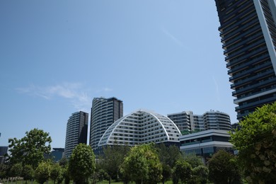 BATUMI, GEORGIA - JUNE 10, 2022: Beautiful view of White Sails Residential Hotel on sunny day