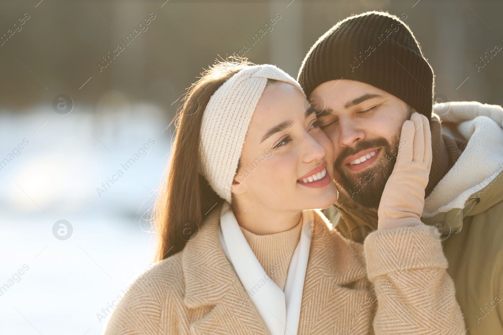 Photo of Beautiful young couple enjoying winter day outdoors