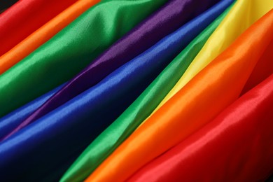 Photo of Rainbow LGBT flag as background, closeup view