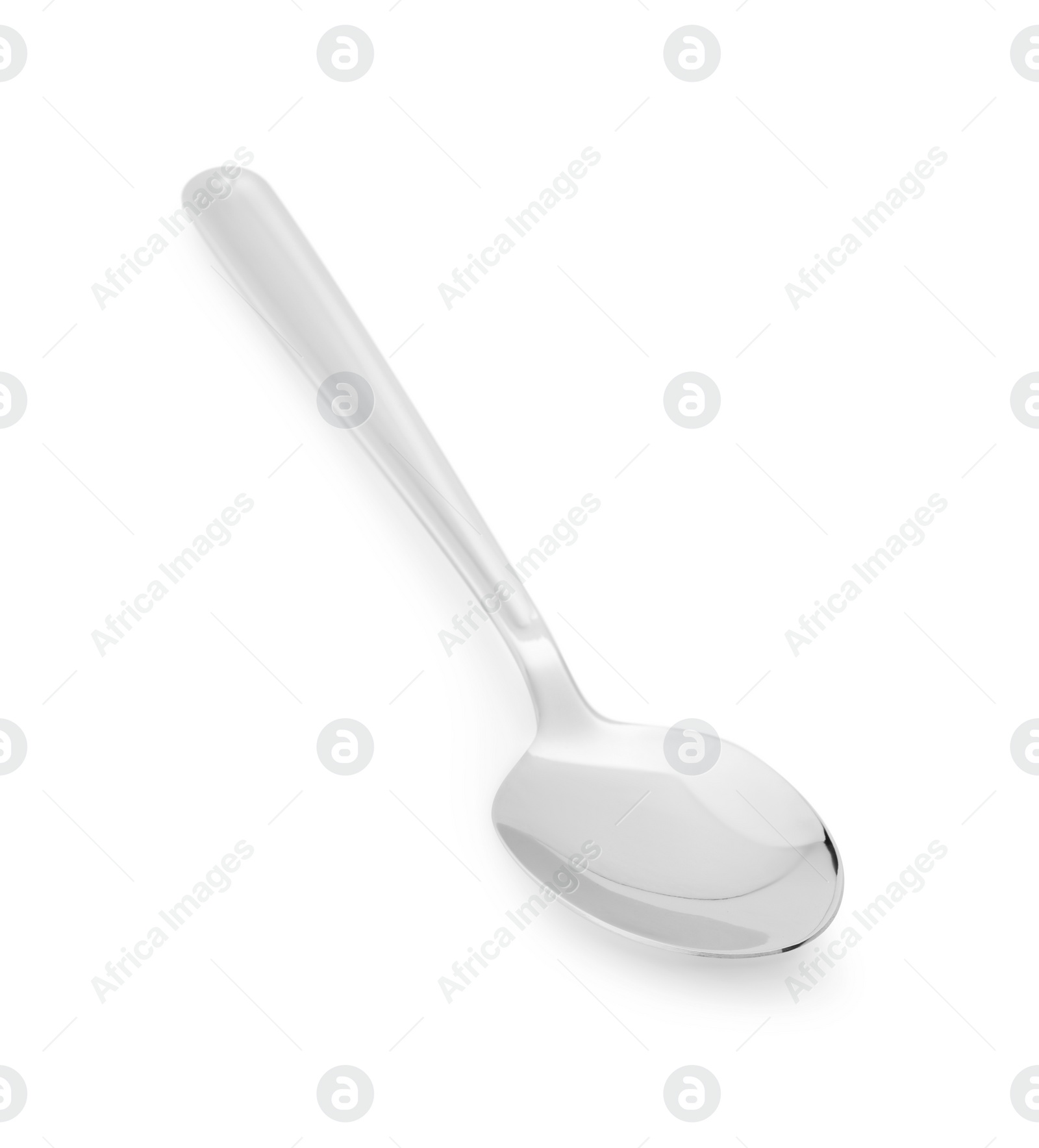 Photo of One new shiny spoon isolated on white