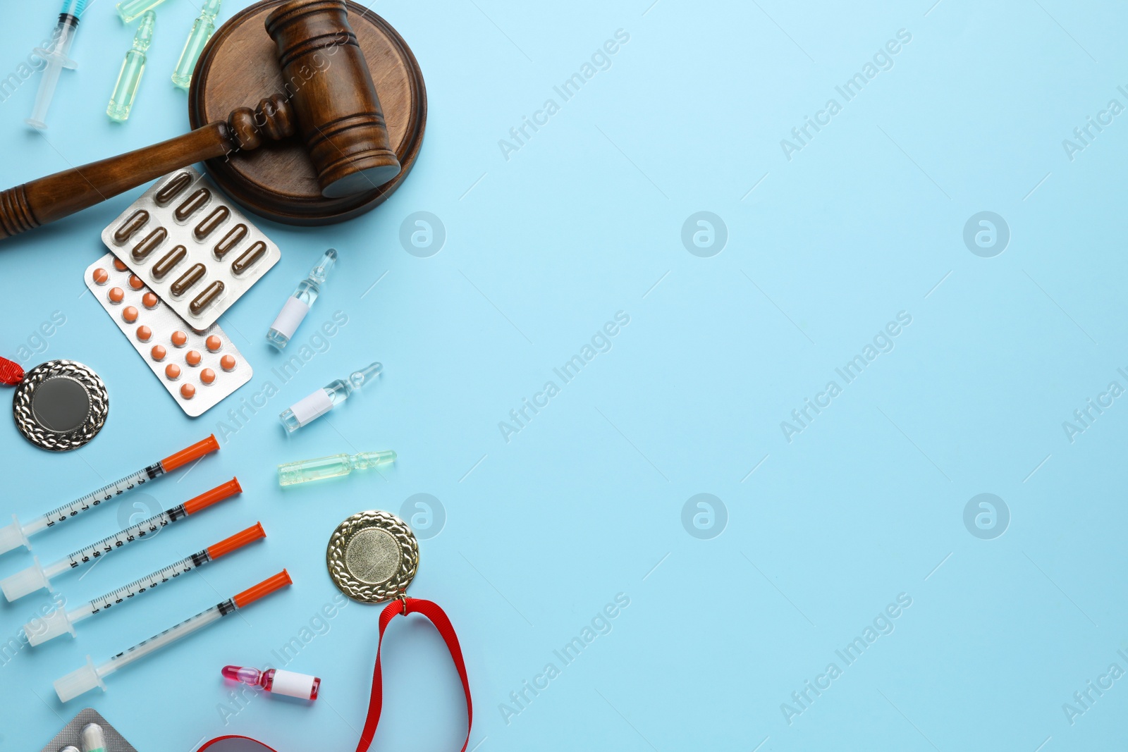 Photo of Flat lay composition with drugs on light blue background, space for text. Doping control