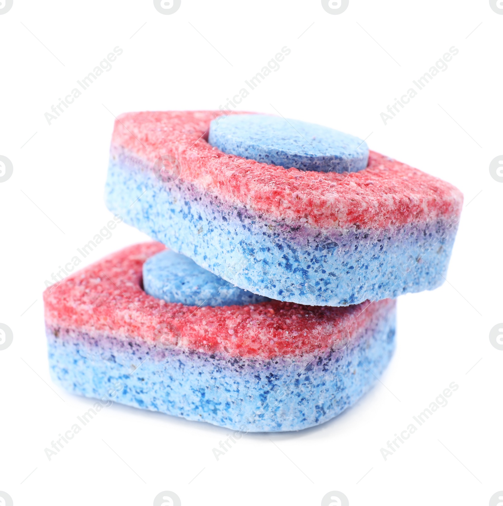 Photo of Two dishwasher detergent tablets on white background