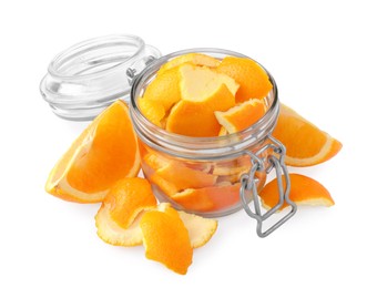Photo of Orange peels preparing for drying and fresh fruit isolated on white