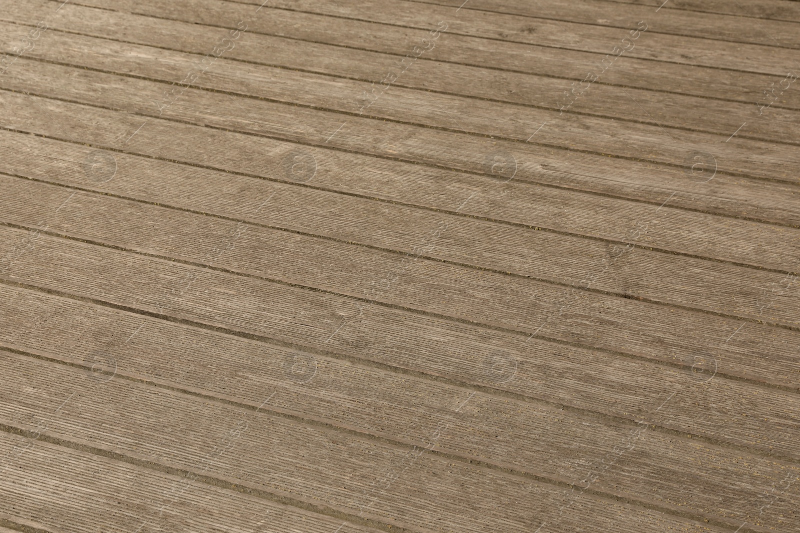 Photo of Texture of wooden terrace construction as background, above view