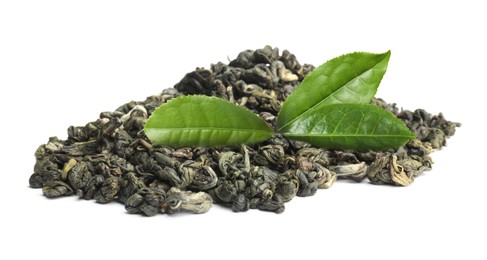 Dry green tea and fresh leaves on white background