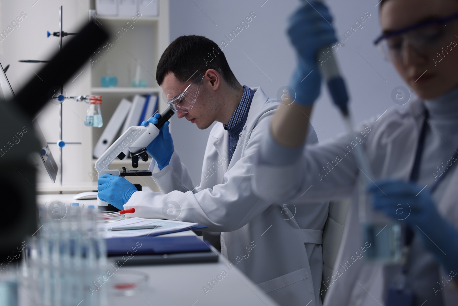 Photo of Scientists working with samples in laboratory. Medical research