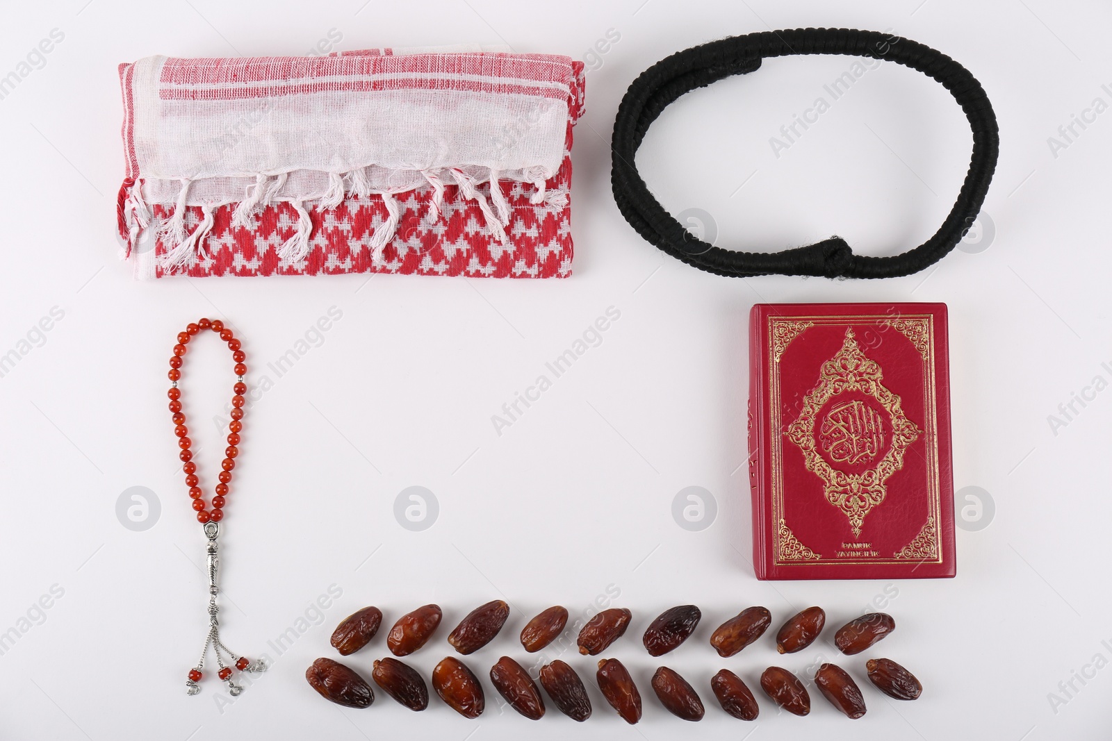 Photo of Flat lay composition with Muslim prayer beads, Quran and space for text on white background