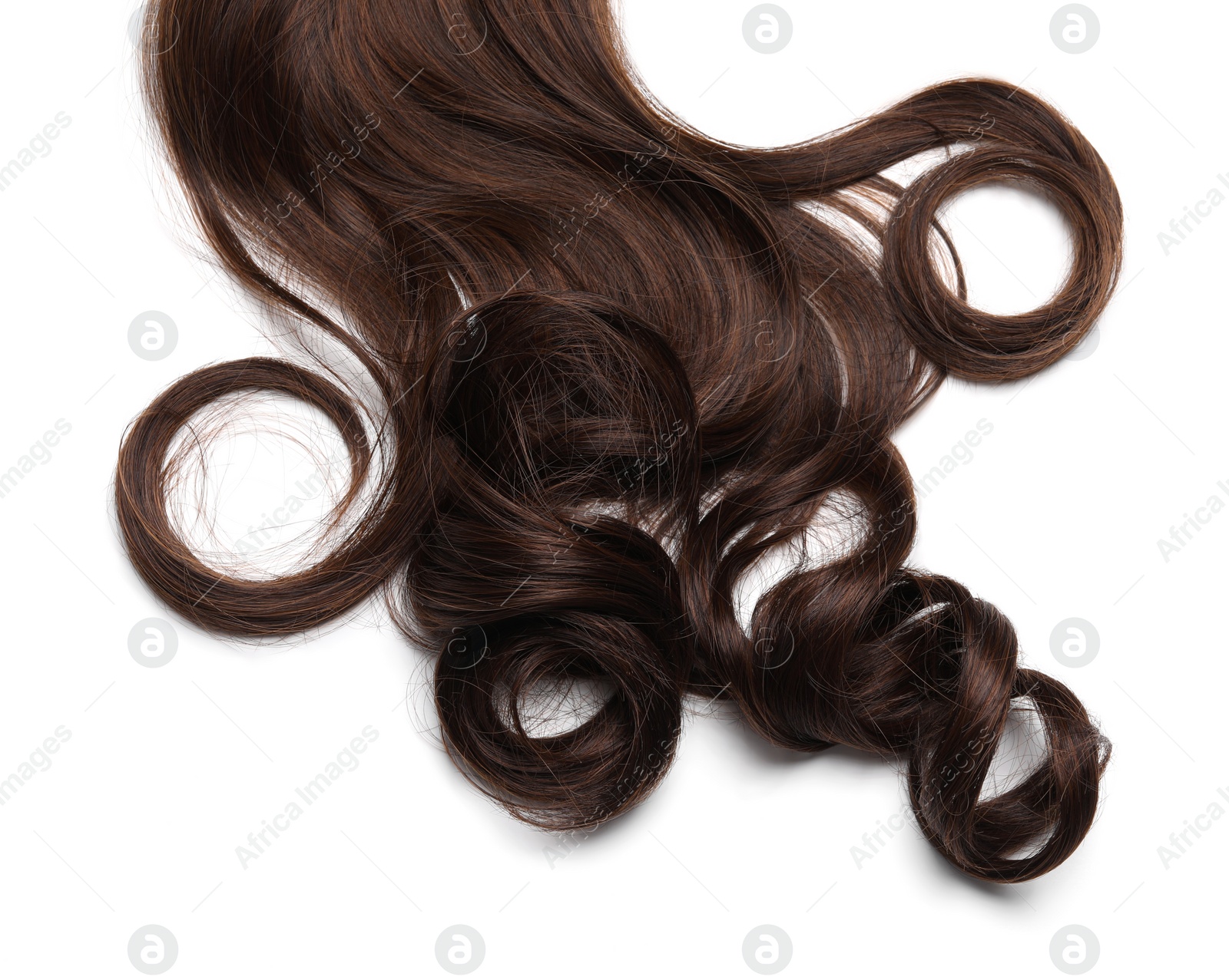 Photo of Beautiful dark brown curly hair isolated on white, top view