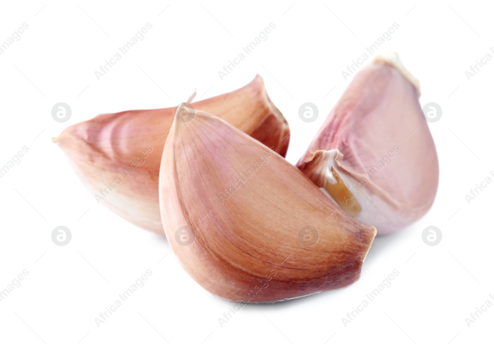 Photo of Fresh unpeeled garlic cloves on white background