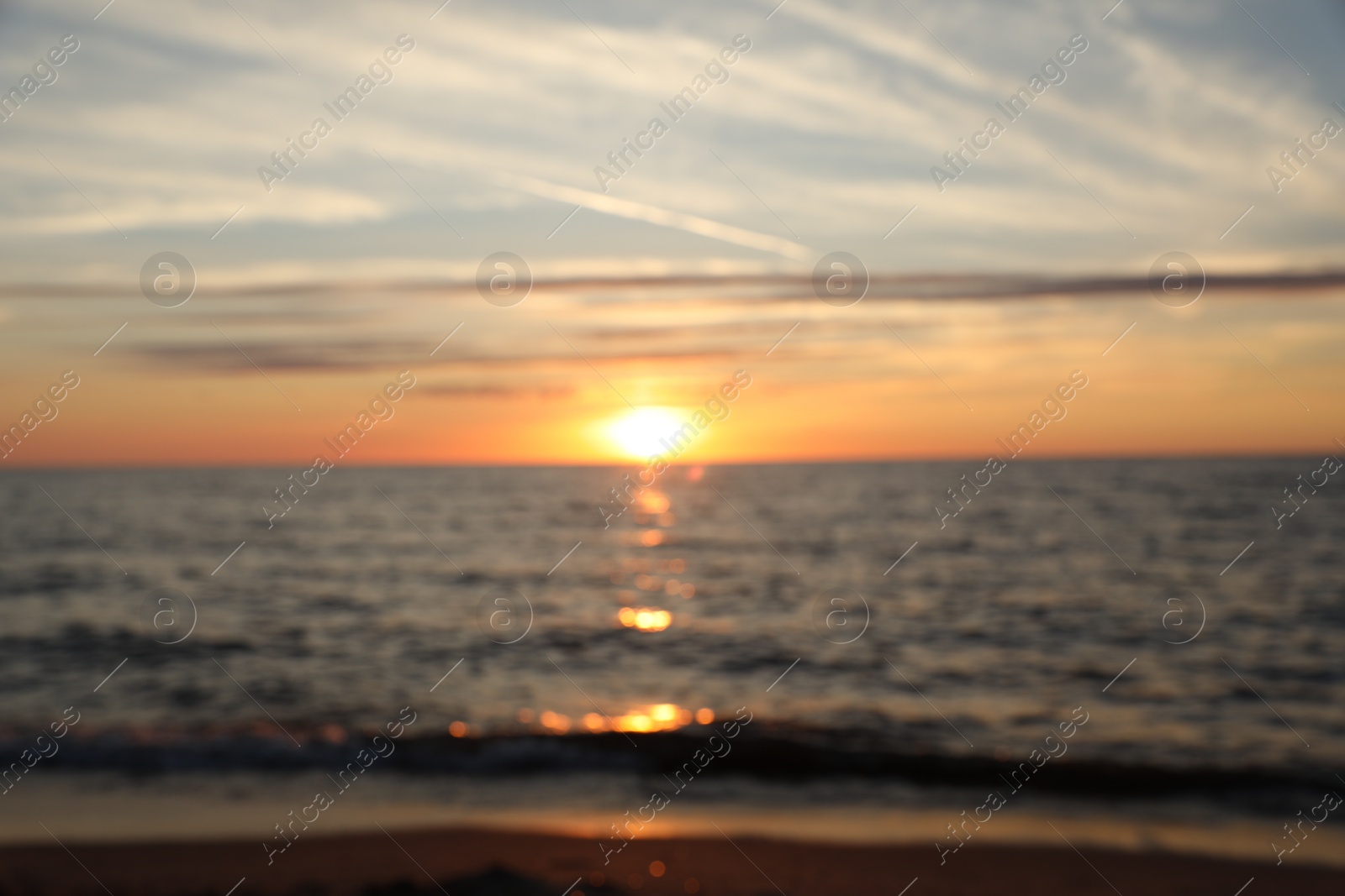 Photo of Blurred view of beautiful sea at sunset. Tropical beach