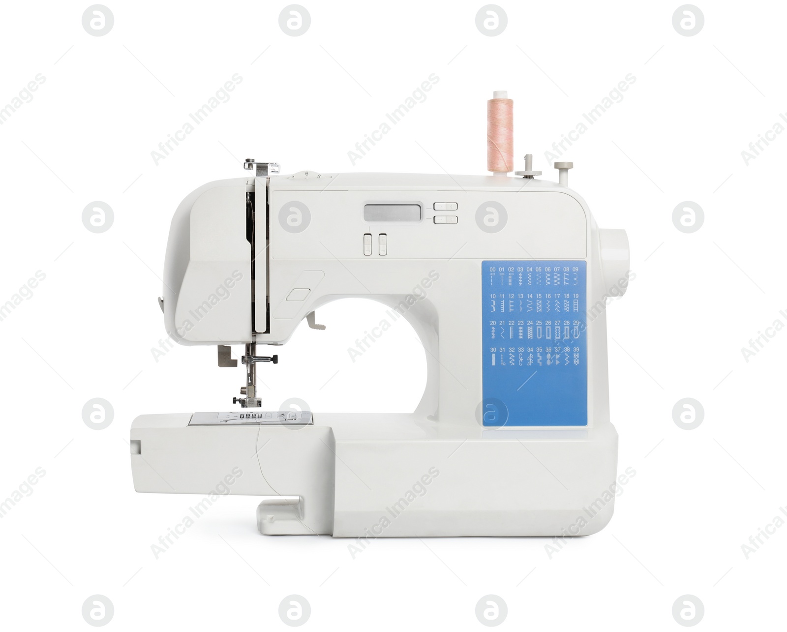 Photo of Modern sewing machine with pink thread isolated on white