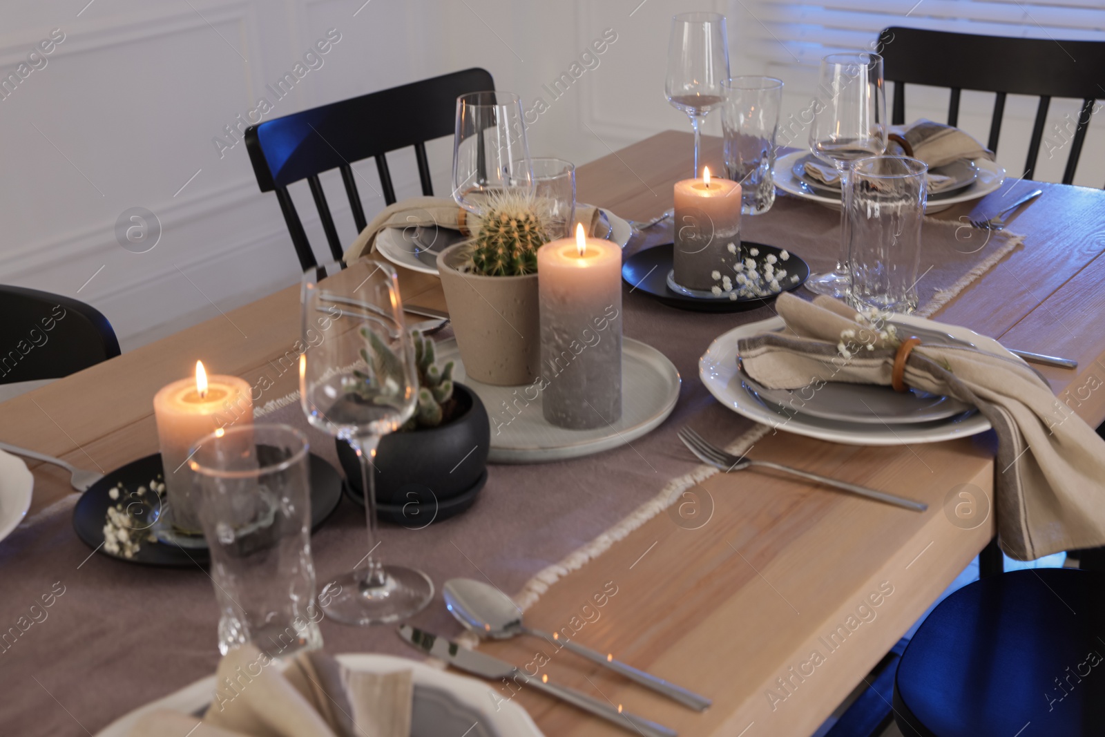 Photo of Festive table setting with beautiful tableware and decor indoors