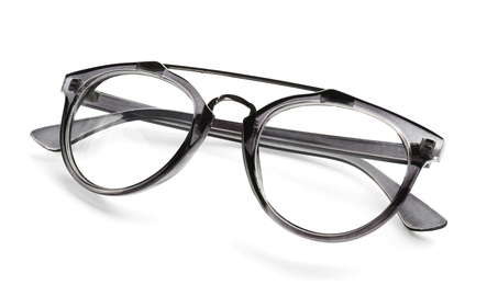 Photo of Glasses with corrective lenses on white background. Vision problem
