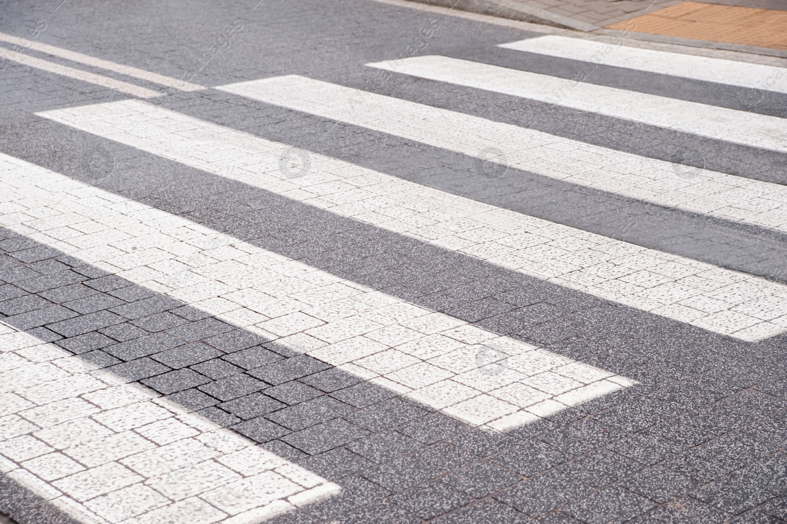 Photo of View on pedestrian crossing in city. Road regulations