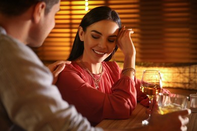 Man and woman flirting with each other in bar