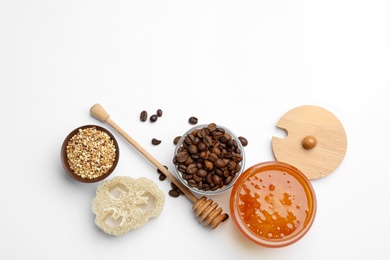 Different ingredients for handmade face mask on white background, top view