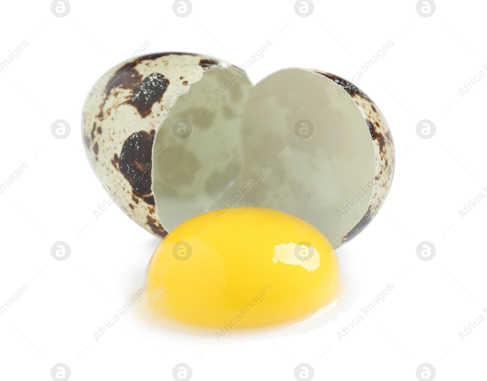 Photo of One cracked quail egg on white background