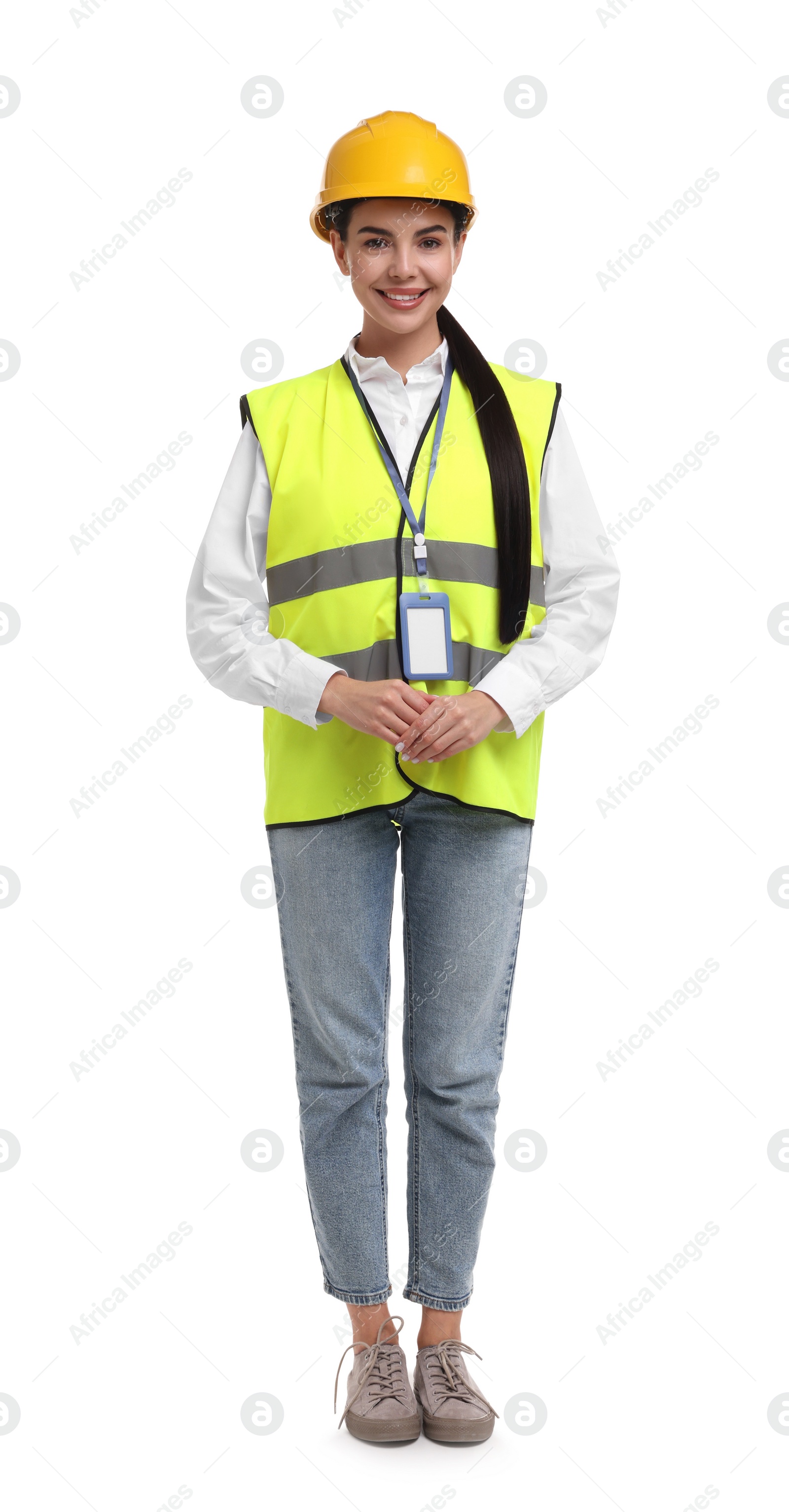 Photo of Engineer with hard hat and badge on white background