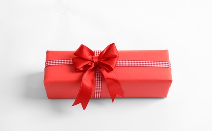 Beautifully wrapped gift box on white background