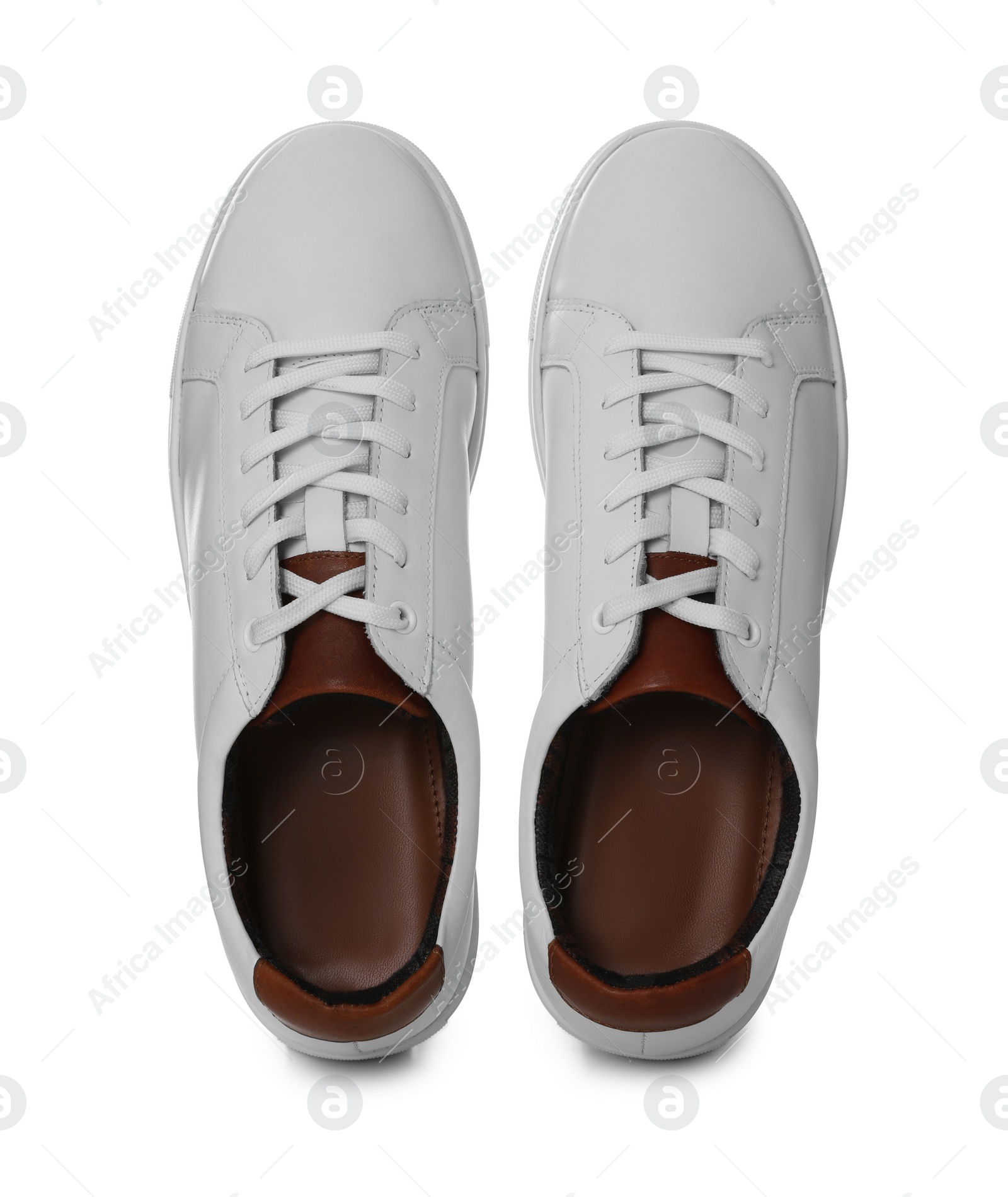 Photo of Pair of stylish sports shoes on white background