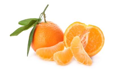 Photo of Fresh ripe tangerines on white background. Citrus fruit