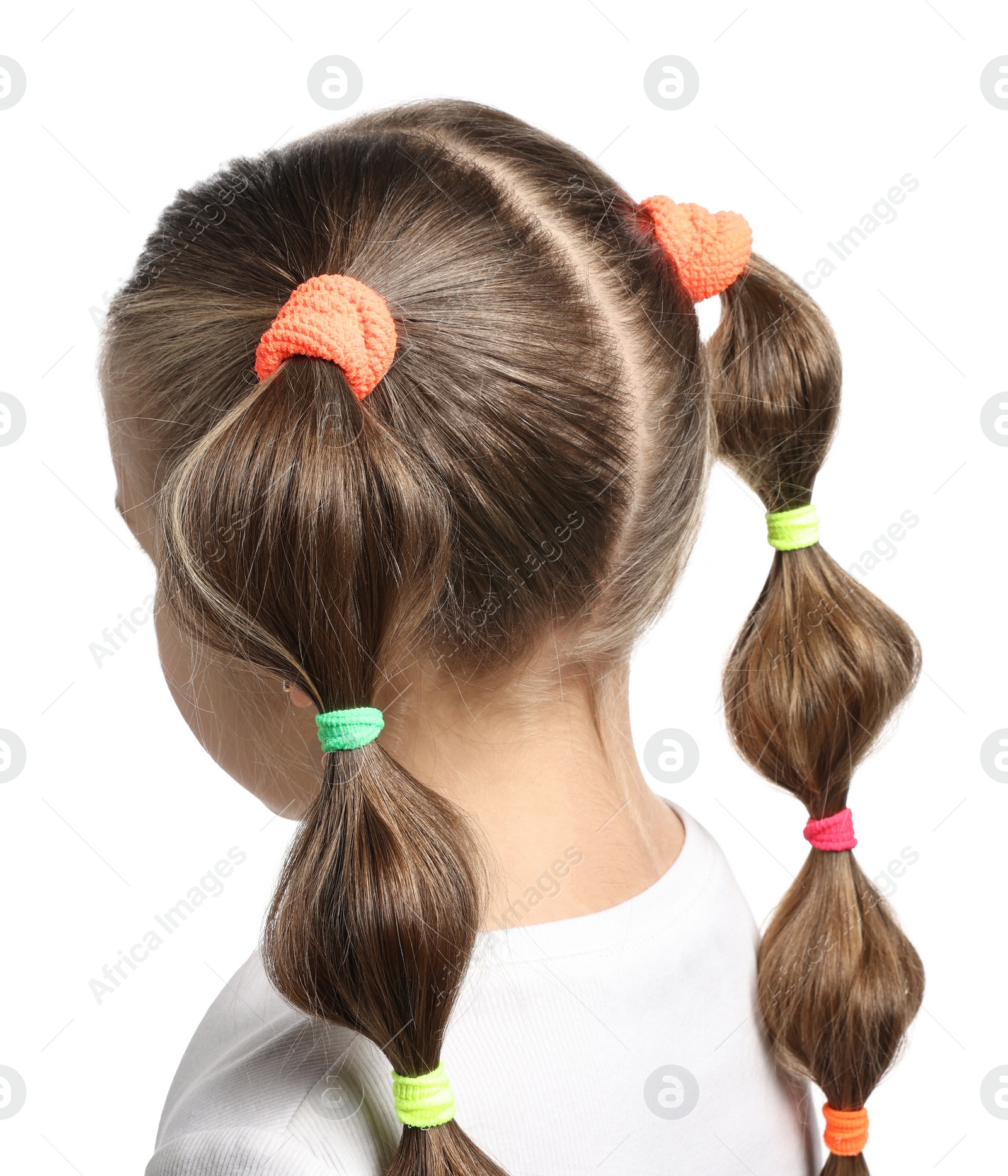 Photo of Little girl with beautiful hairstyle on white background, back view