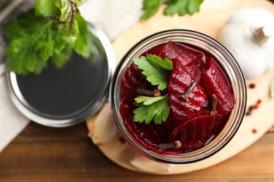 Photo of Delicious pickled beets in jar, top view