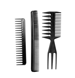 Photo of Set of plastic hair combs isolated on white