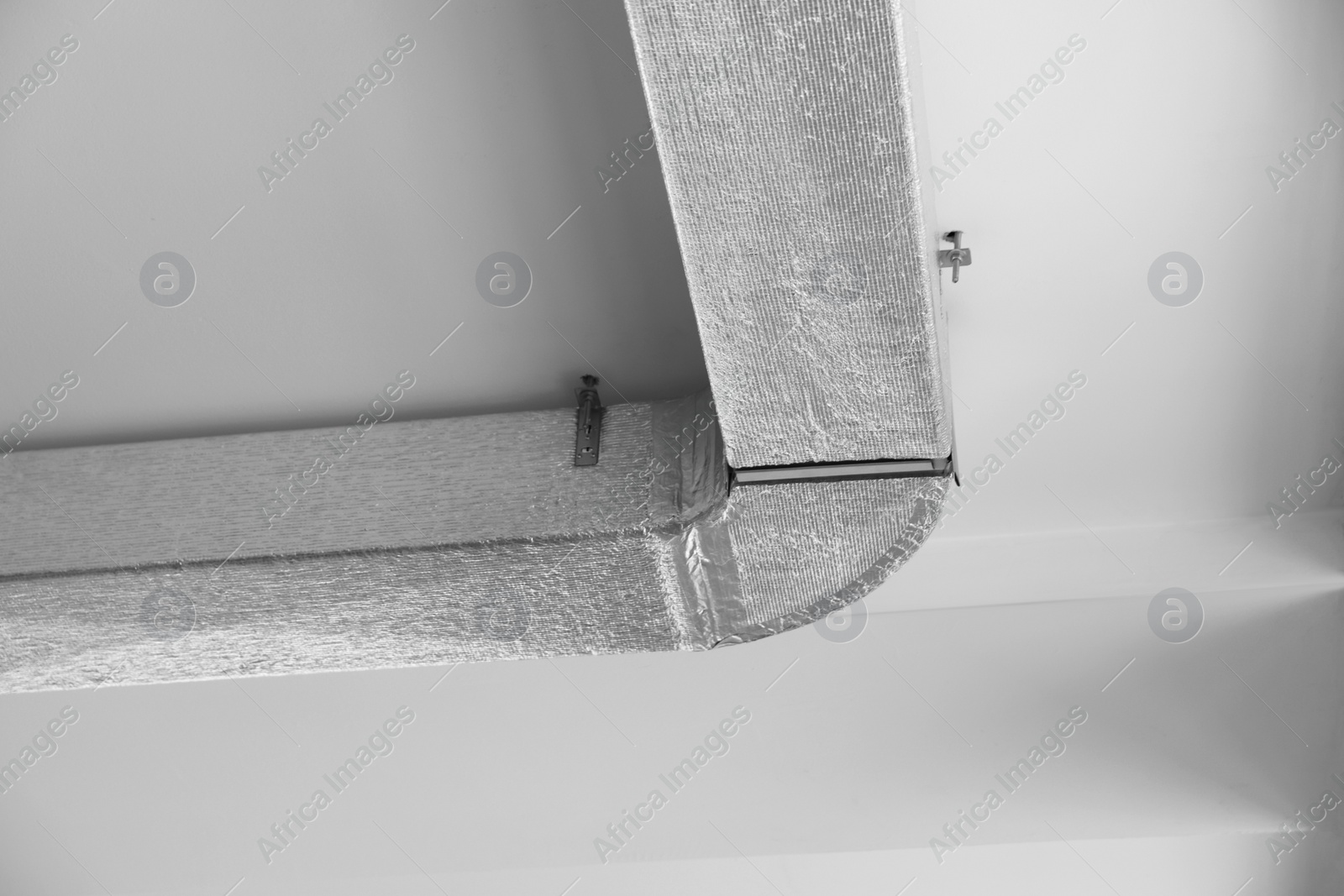 Photo of Ceiling with ventilation system indoors, bottom view