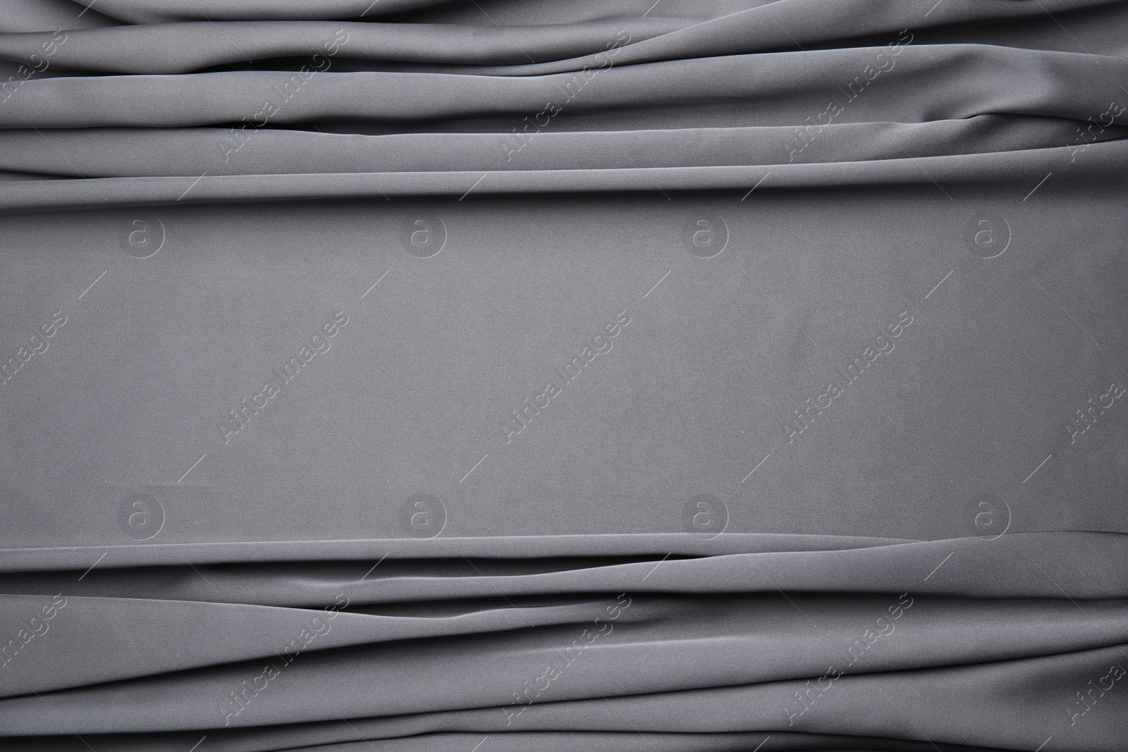 Photo of Texture of delicate black silk as background, top view