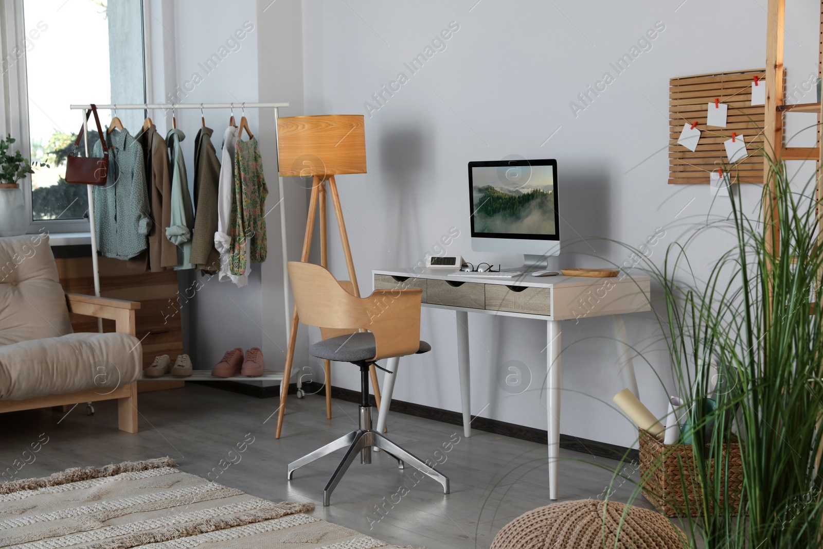 Photo of Stylish home office interior with comfortable workplace