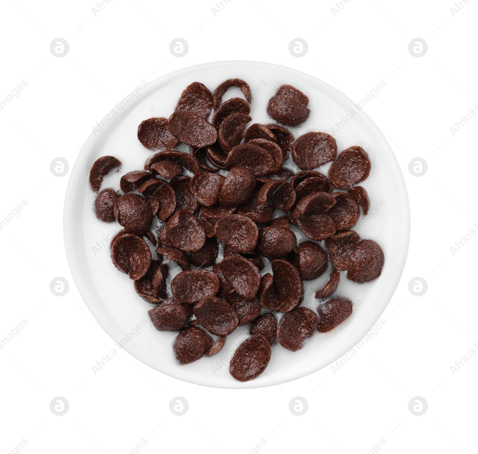 Photo of Breakfast cereal. Corn flakes and milk in bowl isolated on white, top view