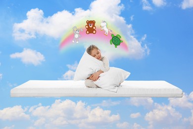 Image of Sweet dreams. Sleepy girl hugging pillow on mattress in blue sky and dreaming about her toys