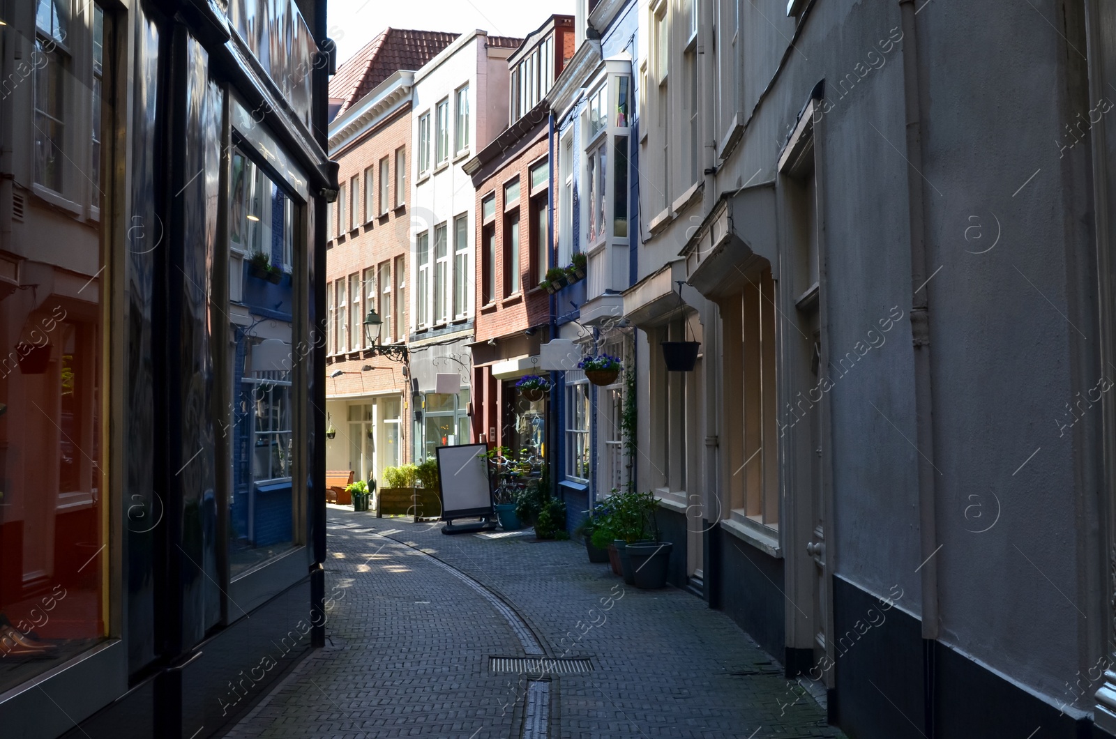 Photo of Beautiful buildings on city street. Urban architecture