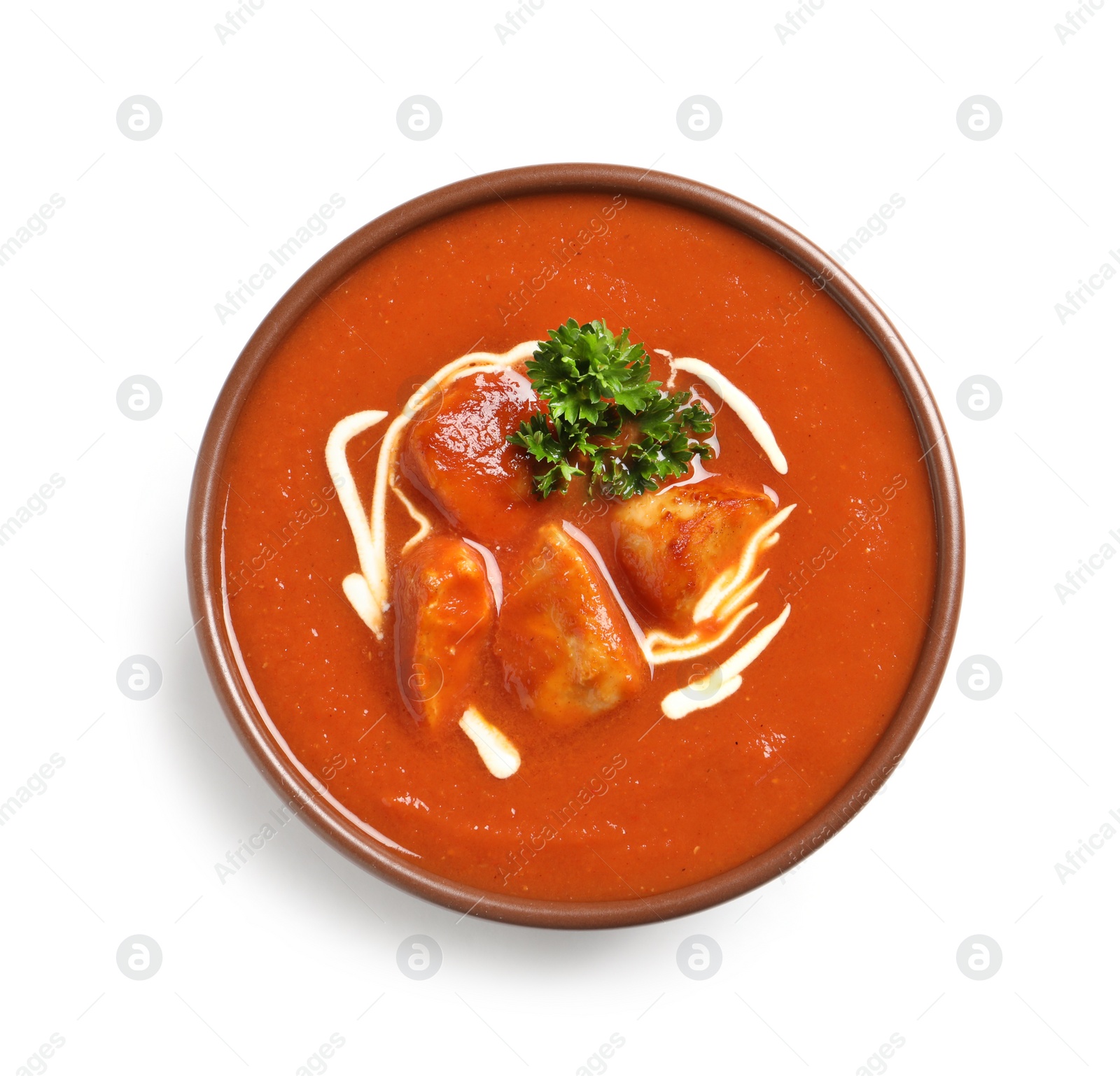 Photo of Bowl of delicious butter chicken on white background, top view. Traditional indian Murgh Makhani