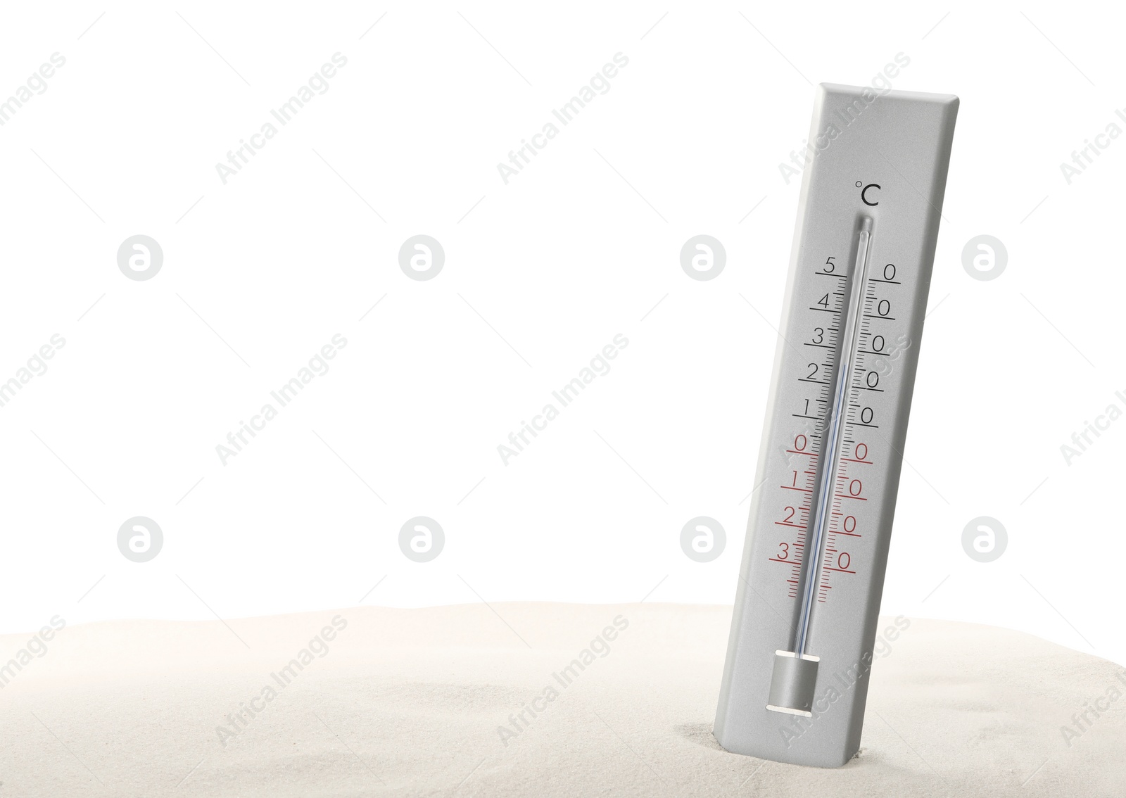 Photo of Weather thermometer in sand against white background