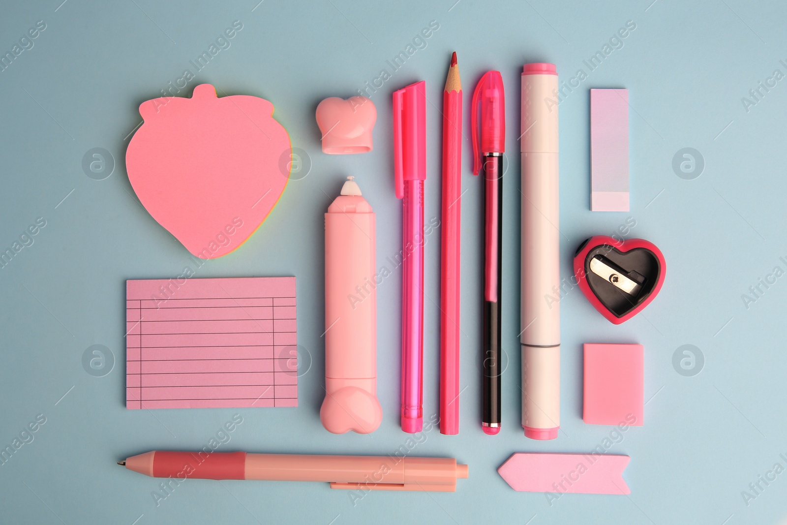 Photo of Flat lay composition with sticky note and other school stationery on light blue background, space for text. Back to school