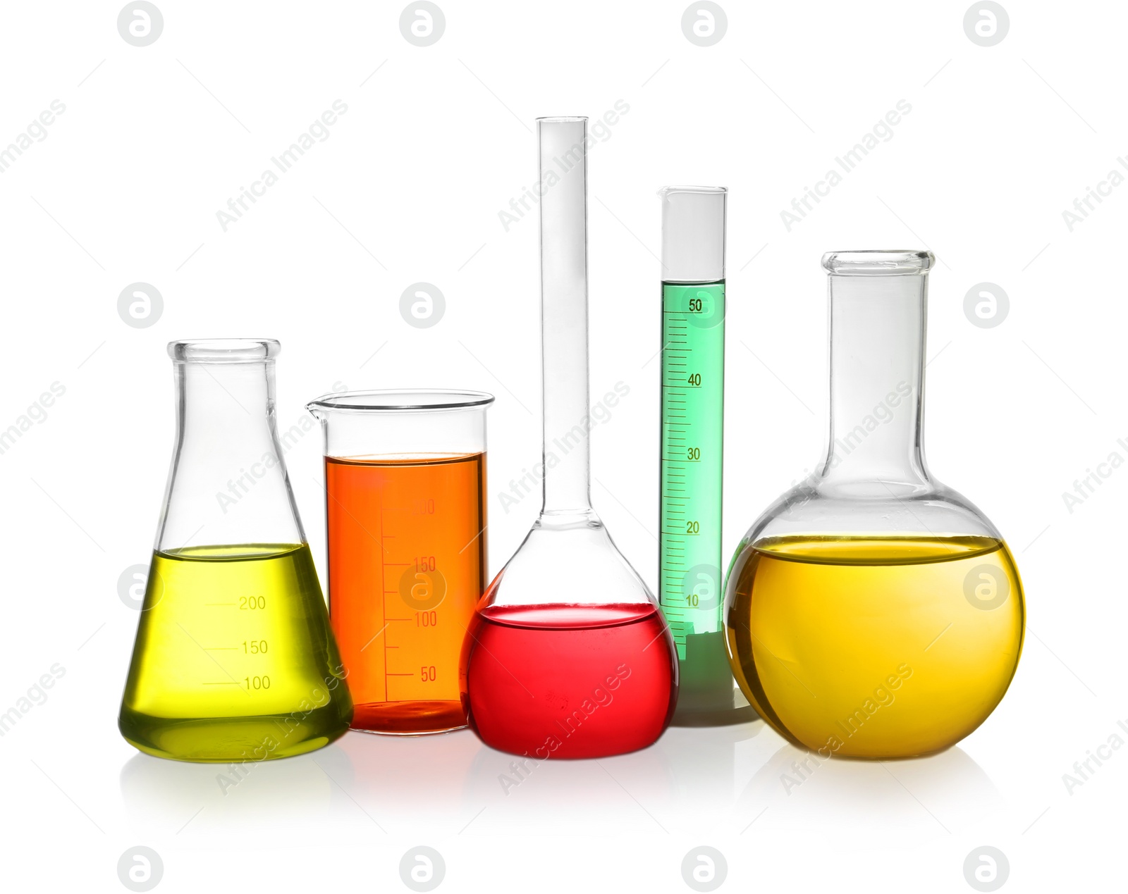 Photo of Laboratory glassware with colorful liquids on white background