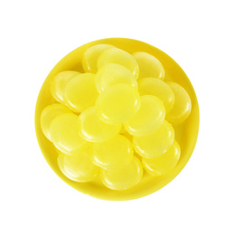 Photo of Tasty small lemon drops on white background, top view