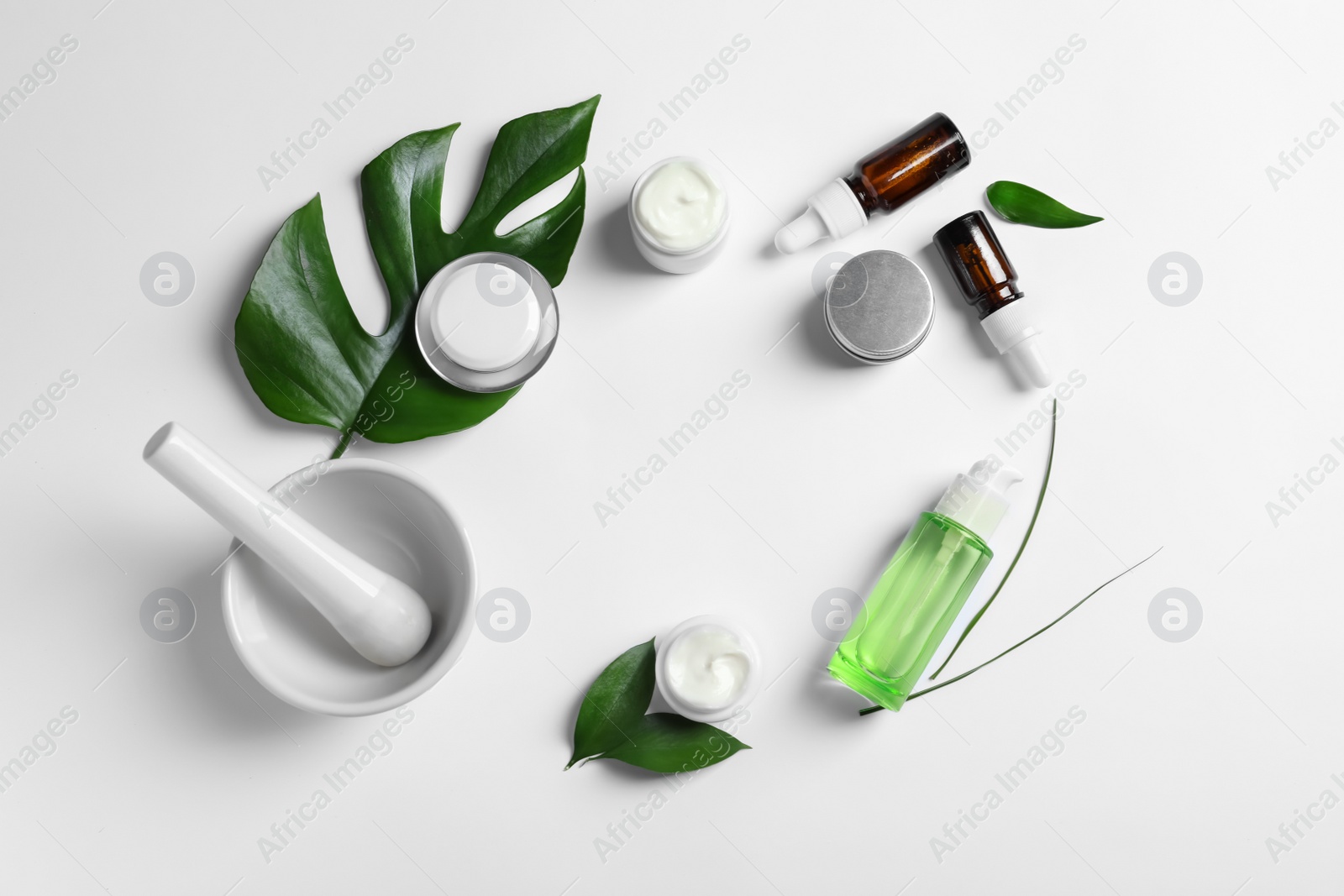 Photo of Flat lay composition with cosmetic products on white background