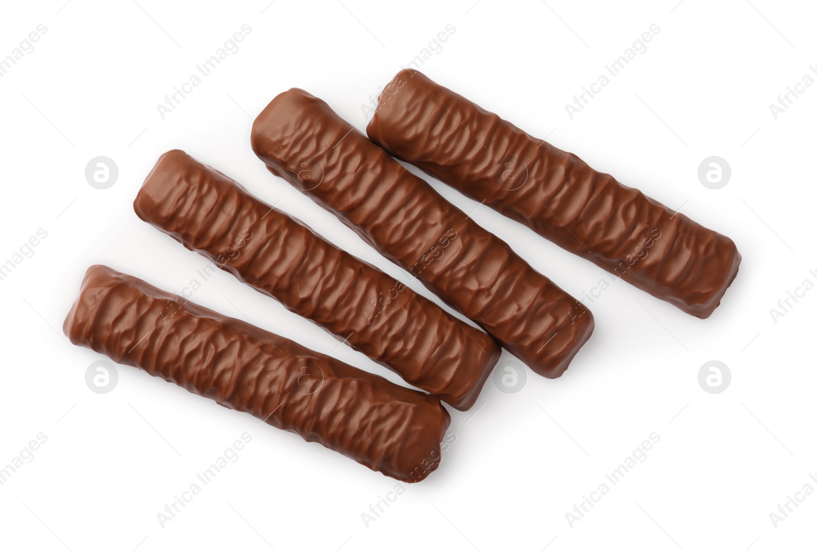 Photo of Sweet tasty chocolate bars on white background, top view