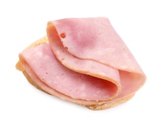 Photo of Piece of bread with tasty ham slice isolated on white