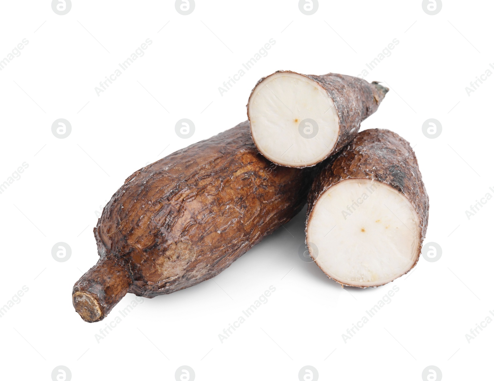 Photo of Whole and cut cassava roots isolated on white